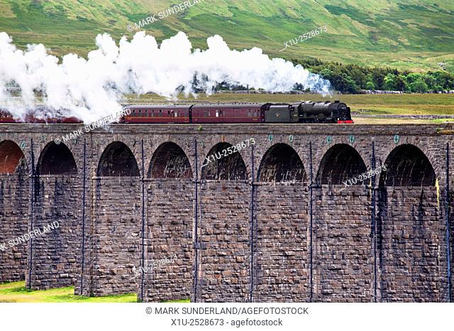 Steam Train Hauled by The Scots Guardsman Crossing the Ribblehead Viaduct Yorkshire Dales England