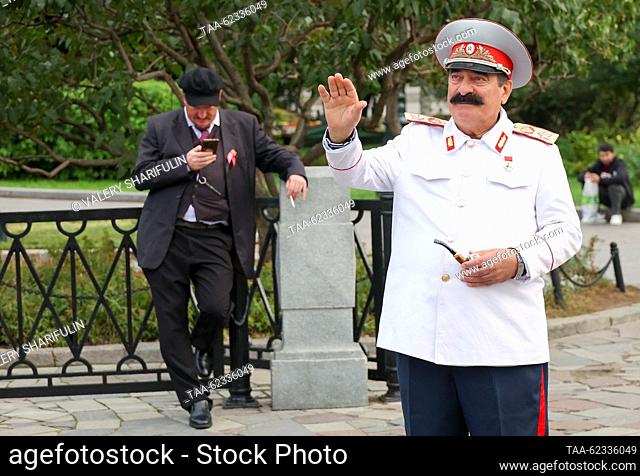 RUSSIA, MOSCOW - SEPTEMBER 18, 2023: A street performer dressed as Joseph Stalin is seen in the Alexander Garden. Valery Sharifulin/TASS
