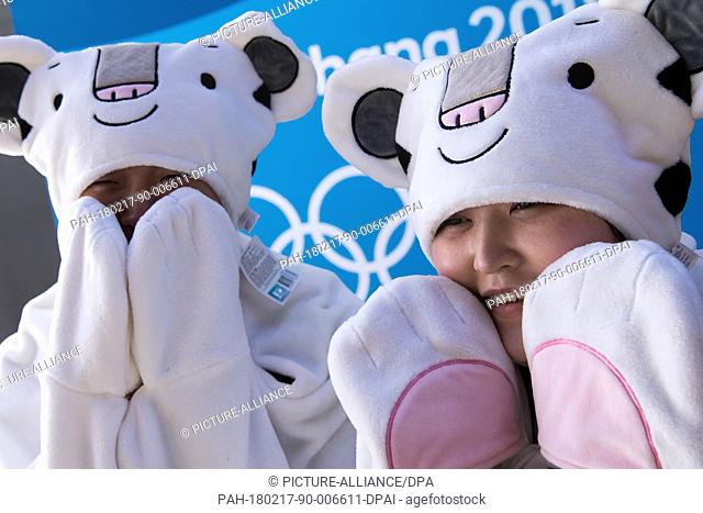 Female volunteers wearing cosutmes of olympic mascot Soohorang in the Gangneung Arena in Gangneung, South Korea, 17 February 2018