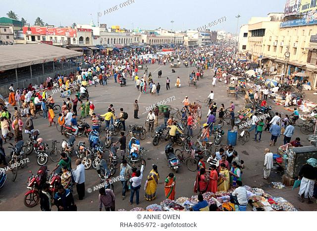 Puri town centre showing busy main street, shops and marketplace near Jagannath Temple to Lord Vishnu, Puri, Odisha, India, Asia