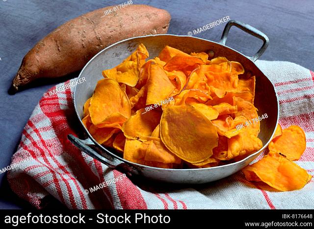 Sweet potato (Ipomoea batatas) and sweet crisps in skin