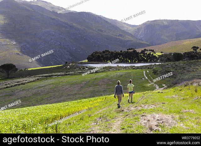 Teenage girl and mother hiking, Stanford Valley Guest Farm, Stanford, Western Cape, South Africa