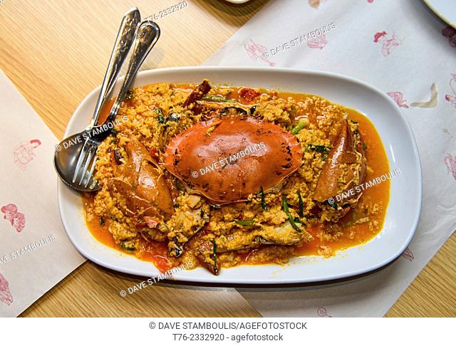 delicious poo pad prong garee crab curry at a restaurant in Bangkok, Thailand