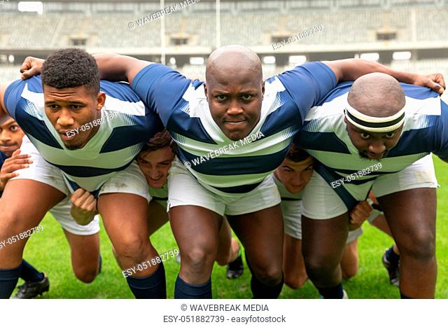 Group of diverse male rugby player ready to play rugby match in stadium