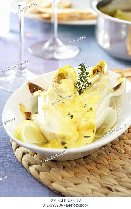 Baked chickory with melted cheese