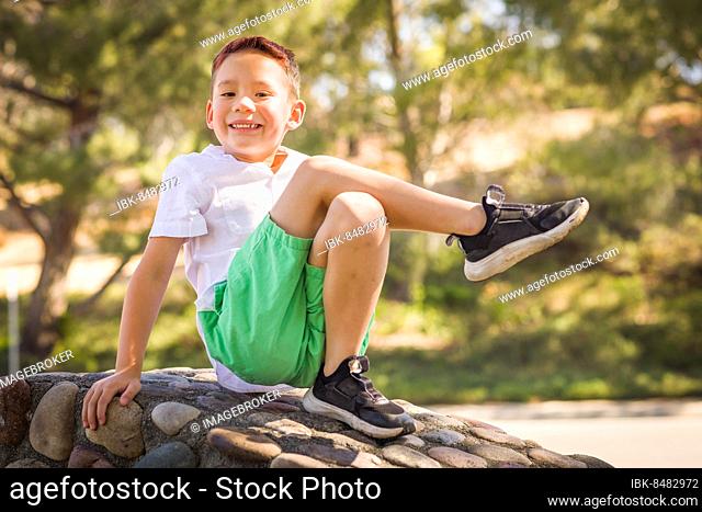 Outdoor portrait of a biracial chinese and caucasian boy