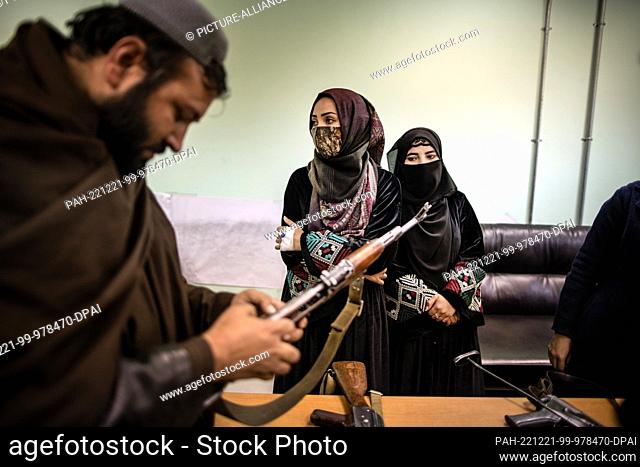 17 November 2022, Afghanistan, Kabul: Women are trained to use machine guns as part of their training as police officers