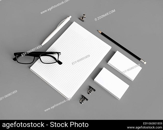 Photo of blank stationery set on gray paper background. Corporate identity mock up for placing your design