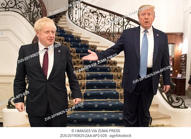 August 25, 2019, Biarritz, France: U.S. President DONALD TRUMP, right, and Britain's Prime Minister BORIS JOHNSON arrive for a bilateral meeting during the G7...