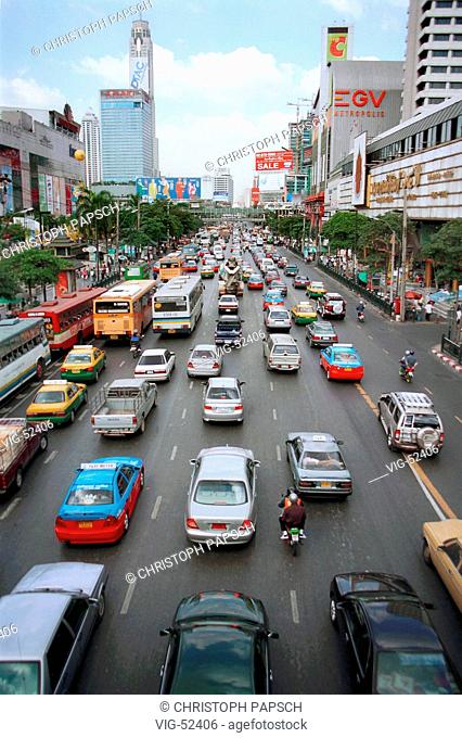 Street traffic in the district Siam Square in Bangkok. - BANGKOK, THAILAND, 10/12/2003