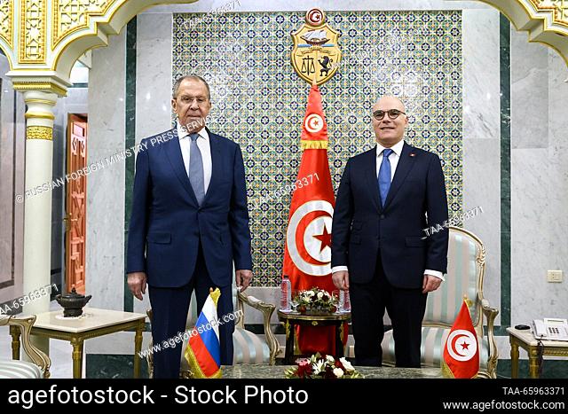TUNISIA, TUNIS - DECEMBER 21, 2023: Russia's Foreign Minister Sergei Lavrov (L) and his Tunisian counterpart Nabil Ammar pose during a bilateral meeting