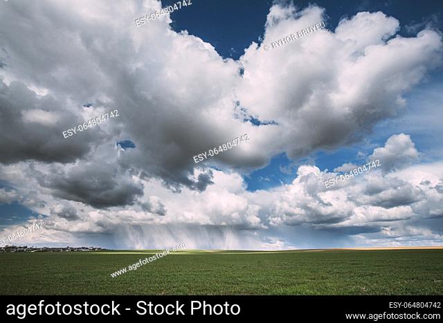 Sky During Rain Horizon Above Rural Landscape Field. Agricultural And Weather Forecast Concept. Storm, Thunder, thunderstorm, stormclouds, Rainy Day