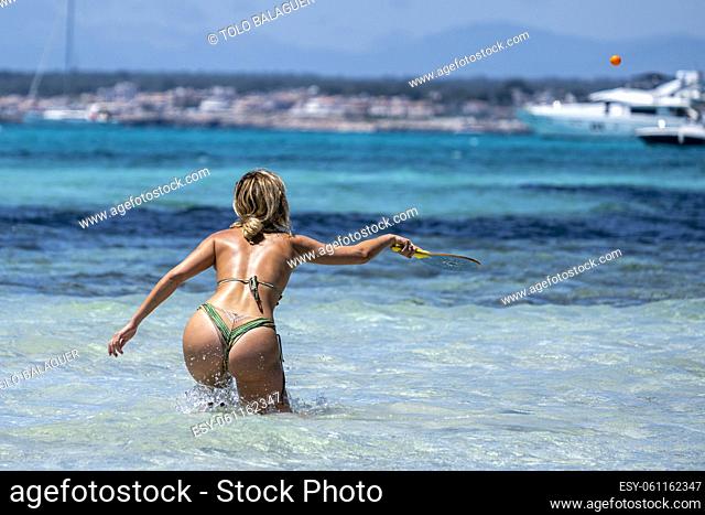 women playing with racket, Es Trenc beach, Campos municipality, Mallorca, Balearic Islands, Spain