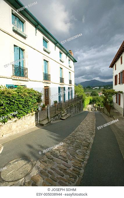 Path between homes in Sare, France in Basque Country on Spanish-French border, a hilltop 17th century village in the Labourd province