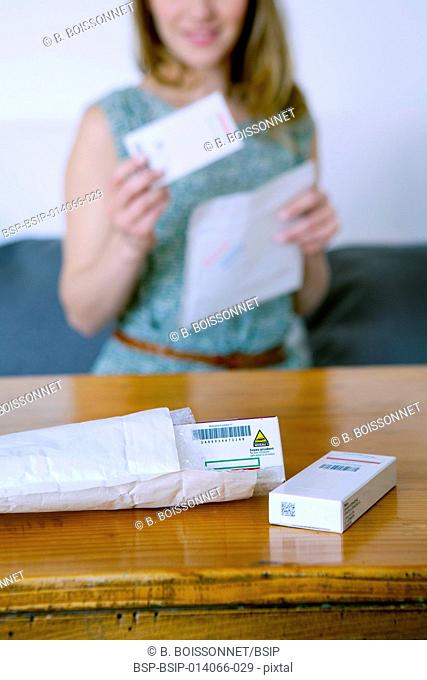 Woman receiving medicines bought on internet