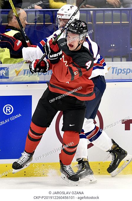 John Beecher of USA, left, and Bowen Byram of Canada in action during the 2020 IIHF World Junior Ice Hockey Championships Group B match between Canada and USA...