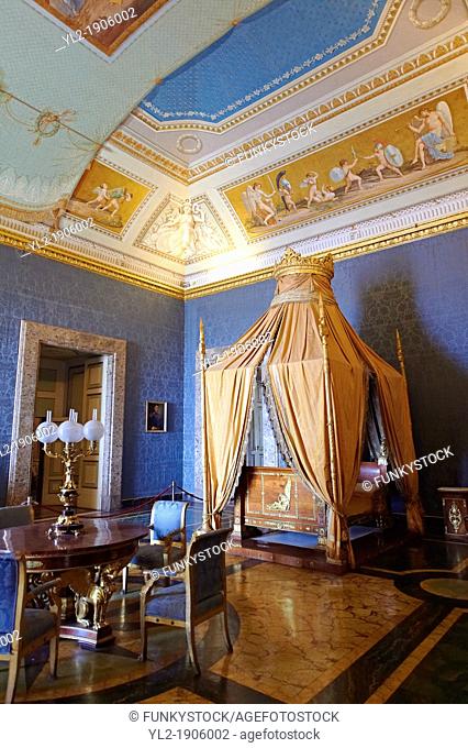 'The Bedroom of Francis II'  The room furnished with a four poster bed, chest of drawers and table in the Empire Style in mahogany & gilt  The vaulted ceiling...