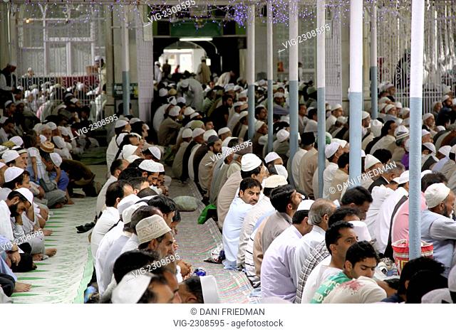 Kashmiri Muslim men performing Friday prayers in a mosque in Srinagar. - SRINAGAR, KASHMIR, INDIA, 25/06/2010