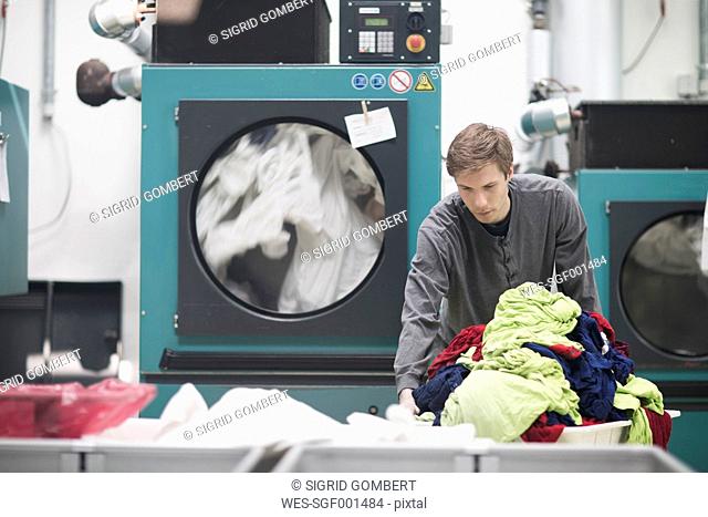 Worker in laundry