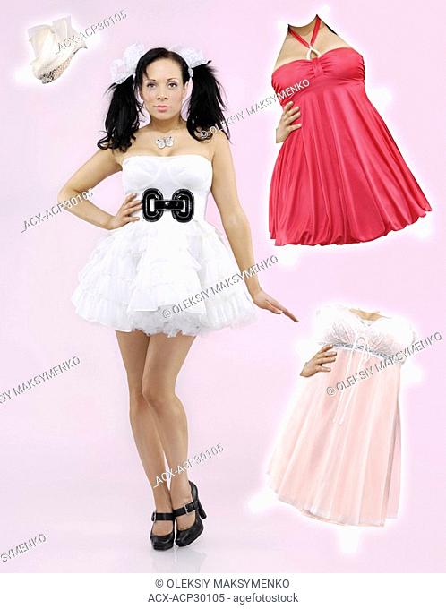 Attractive young paper doll woman and fancy clothes