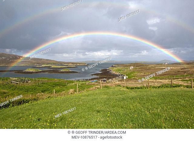 Rainbow over sea loch. North Uist - Outer hebrides - Scotland