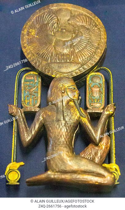 Egypt, Cairo, Egyptian Museum, Tutankhamon jewellery, from his tomb in Luxor : Mirror case in wood and gold, depicting the god Heh holding ""millions of years""...