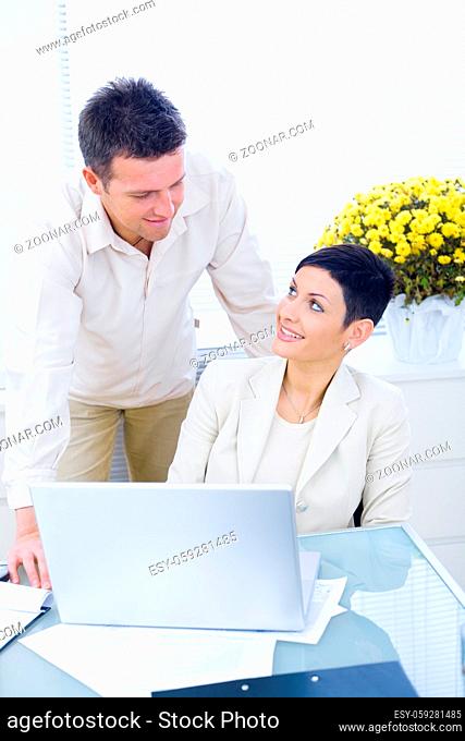 Business couple working together at office