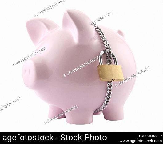 Piggy bank secured with padlock. Clipping path included