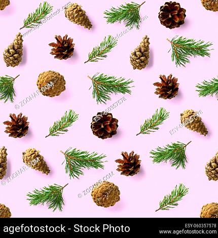 seamless christmas pattern from Pine cones, needles on pink background. modern pine cone christmas collage. Print for paper, fabric