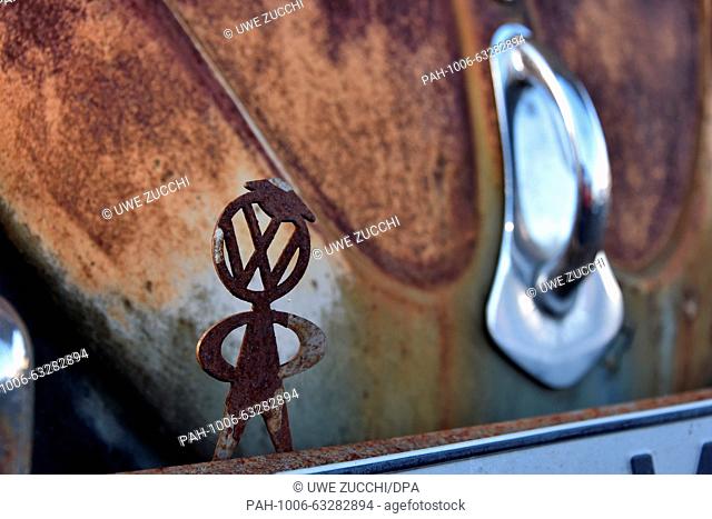 A rusty Volkswagen man stands on the bumper of a VW Beetle in the Beetle garage in Usseln, Germany, 04 November 2015. VW announces hundreds of thousands of...