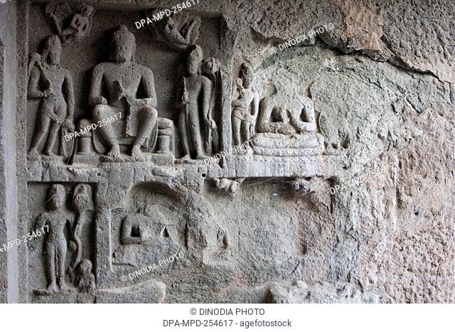 Buddha sculpture on wall, ellora caves, aurangabad, maharashtra, india, asia