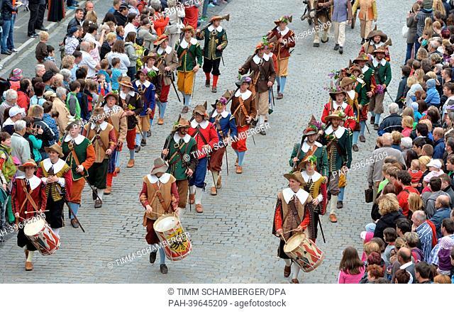 Participants in historical costumes take part in the historic festival 'Der Meistertrunk' in Rothenburg ob der Tauber in Germany, 19 May 2013