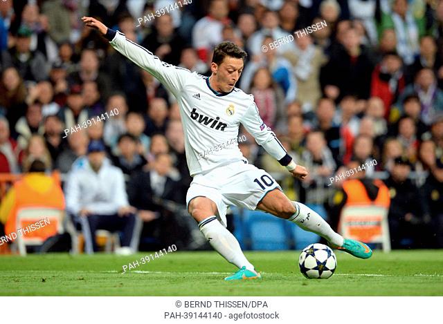 Real's Mesut Oezil controls the ball during the UEFA Champions League semi final second leg soccer match between Borussia Dortmund and Real Madrid at Santiago...
