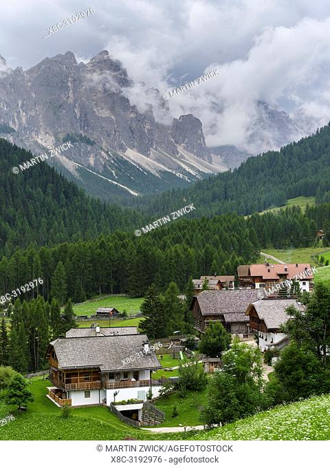 Traditional farms in the mountain hamlets called Viles near Mischi and Seres, Campill, Val Badia, Dolomites. Europe, Central Europe, Italy, Alto Adige