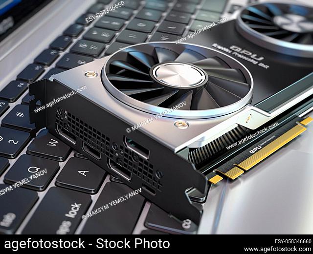 Graphics card on laptop keyboard. Modern gaming GPU graphics processing units. 3d illustration