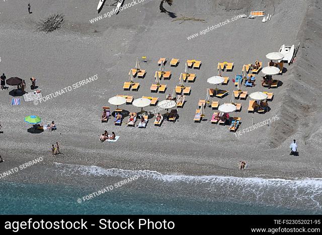 Beach of Taormina. The Police flies over the Calabrian coast by helicopter on the occasion of the reopening of the balnear season , Calabria region