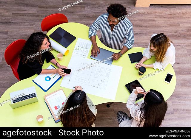 Business team having a meeting at table in conference room
