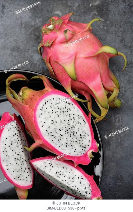 Whole and sliced dragon fruit