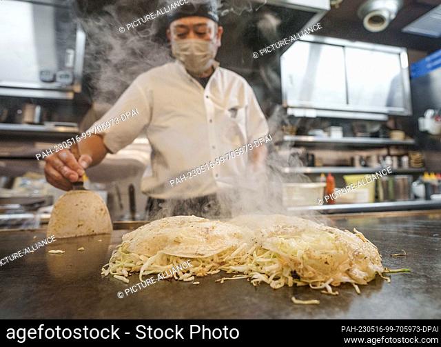 15 May 2023, Japan, Hiroshima: Chef Mitsuo Ise created a special ""Germany"" version for Chancellor Scholz at the traditional Mitchan Sohonten restaurant ahead...