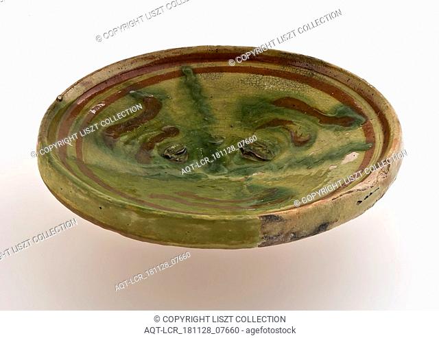 Small earthenware plate on small stand, decorated with brown and green decor on yellow background, plate dish crockery holder soil find ceramic earthenware...