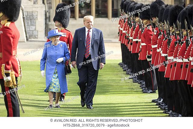 The Queen walks with President Trump as they inspect the Coldstream guards at Windsor castle