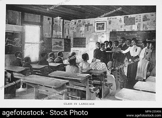 Class in language. Washington, Booker T., 1856-1915 (Author) Johnston, Frances Benjamin, 1864-1952 (Photographer). Working with the hands: being a sequel to...