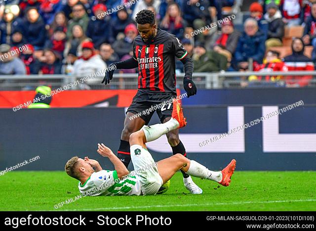 Milano, Italy. 29th, January 2023. Divock Origi (27) of AC Milan and Davide Frattesi (16) of Sassuolo seen in the Serie A match between AC Milan and Sassuolo at...