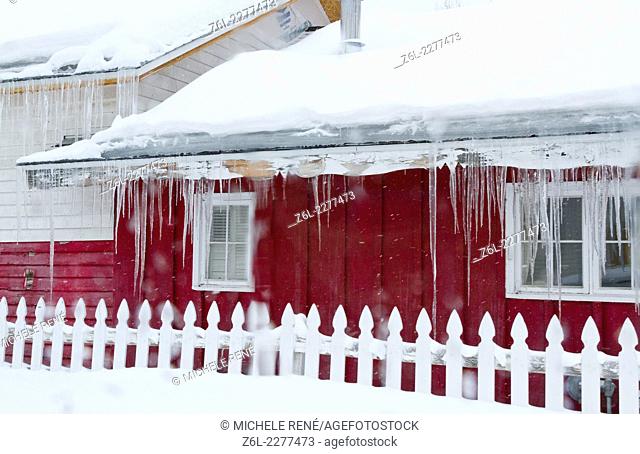 old red house with icicles in Leadville Colorado