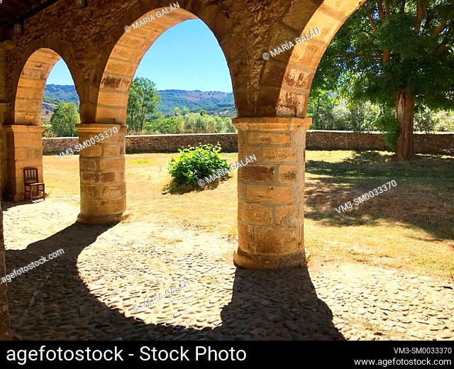Atrium of Romanesque church and landscape. San Salvador de Cantamuda church, Palencia province, Castilla Leon, Spain