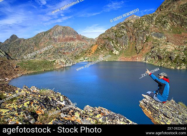 Estats pond in the Catalan Pyrenees in summer on the way of the Pica d'Estats massif in Alt Pirineu Natural Park, Catalonia, Spain, Pyrenees.