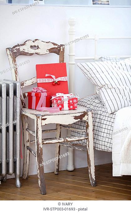 Christmas Gift Boxes On Rusty Chair