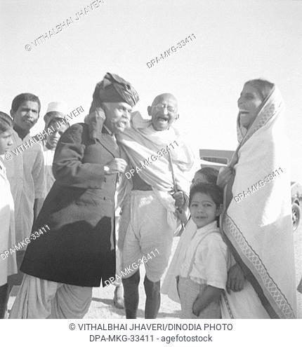 Mahatma Gandhi sharing a hearty laugh at Sevagram Ashram, Vardha, Maharashtra, India, October 1938