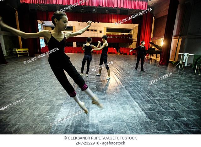 Students at third year of education train with their teacher Aksenova Irina Sergeevna during rehearsal of the Waltz of the Flowers, the part of the Nutcracker
