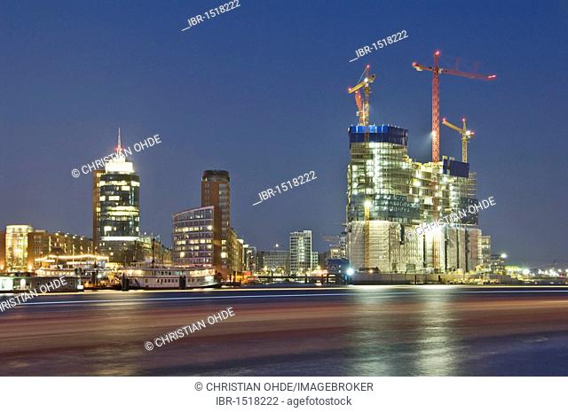 The Elbphilharmonie philharmonic hall under construction in the Hafencity harbour city district of Hamburg, Germany, Europe